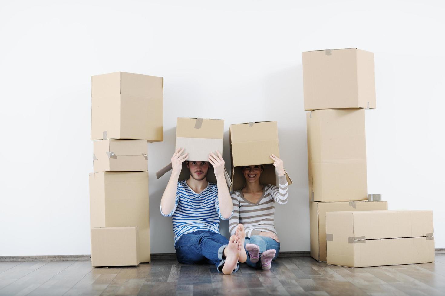 Young couple moving in new house photo