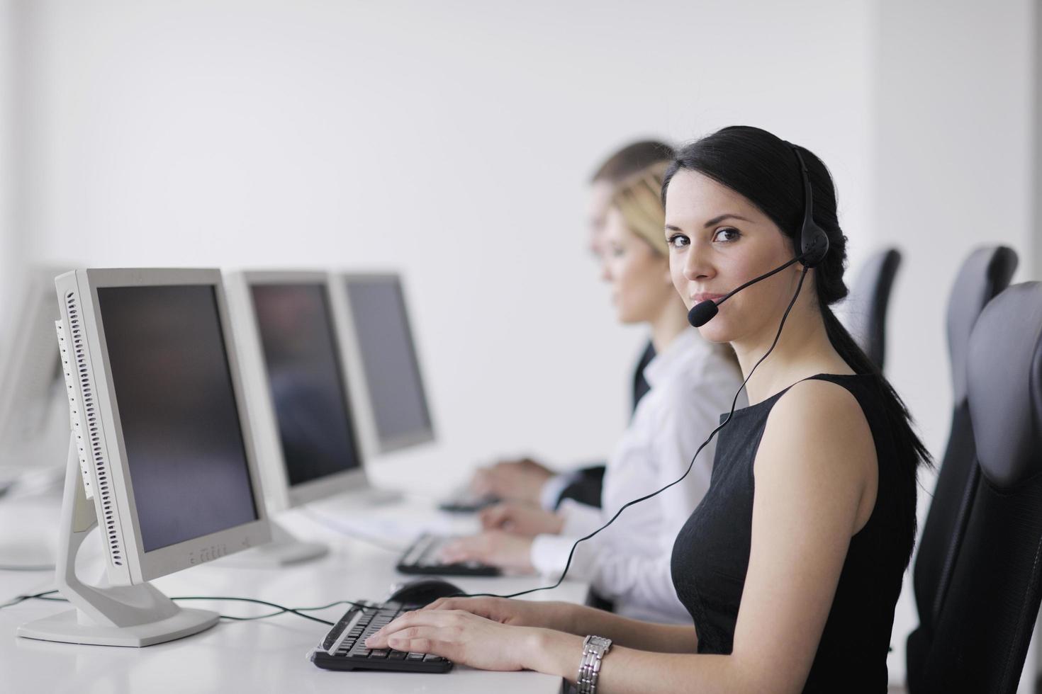 business people group working in customer and help desk office photo