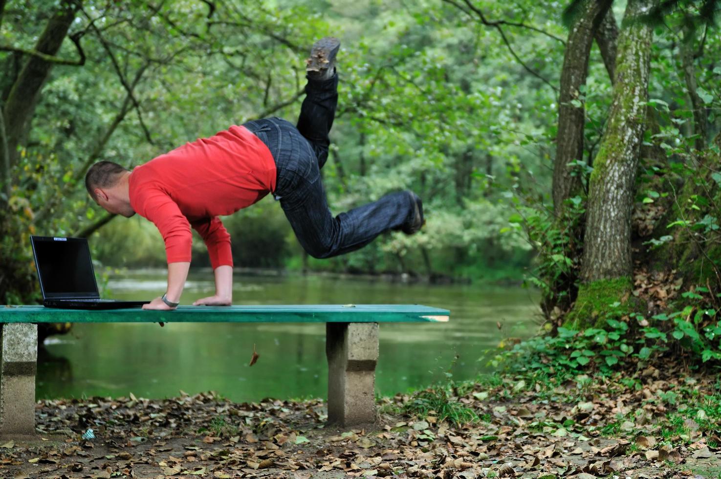 young businessman jump outdoor photo