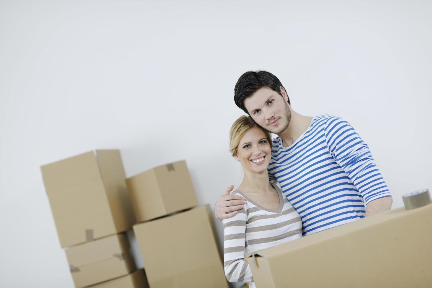 Young couple moving in new home photo