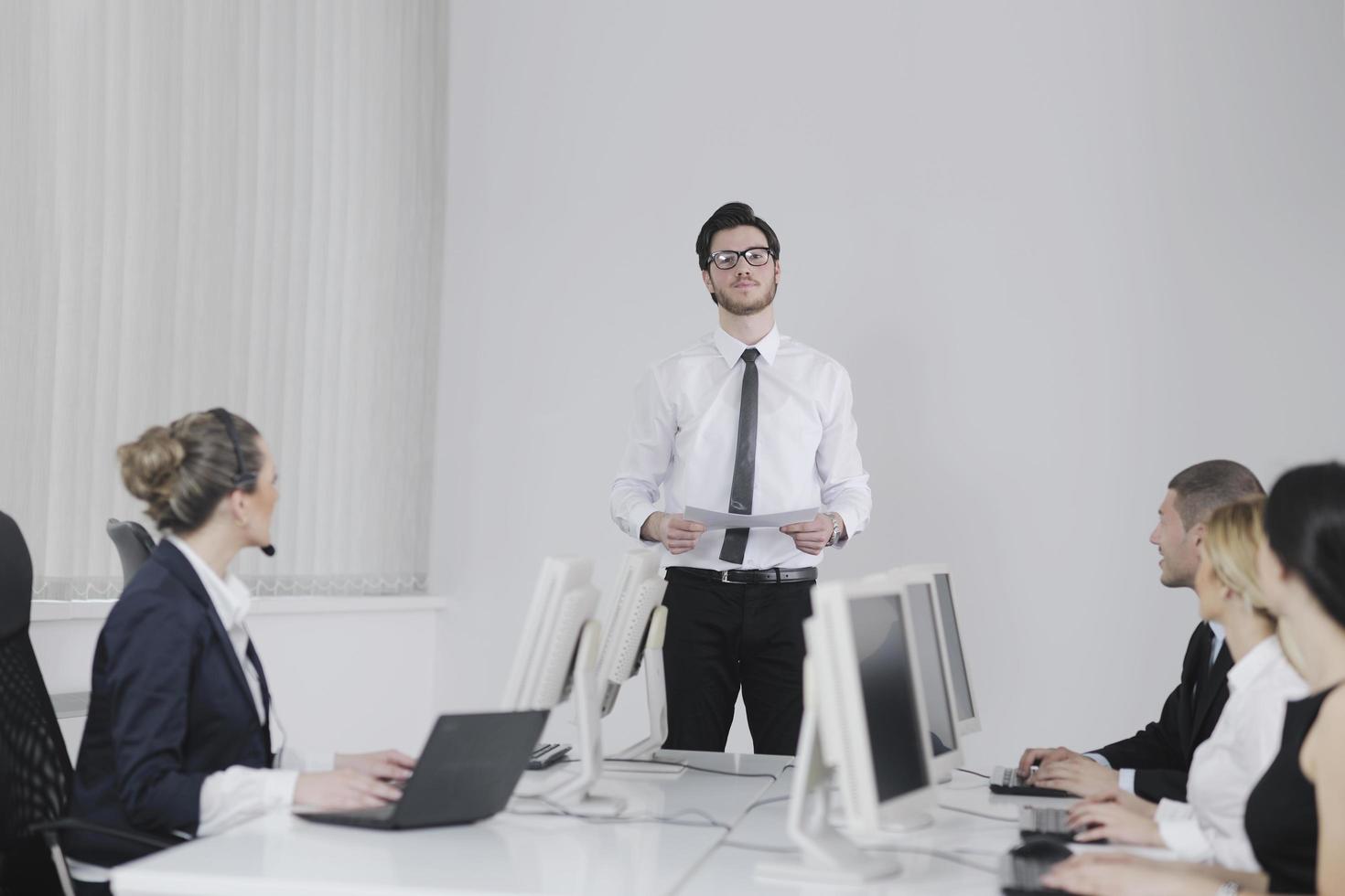 business people group working in customer and help desk office photo