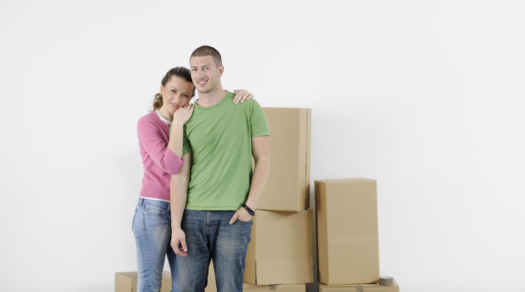 Young couple moving in new home photo