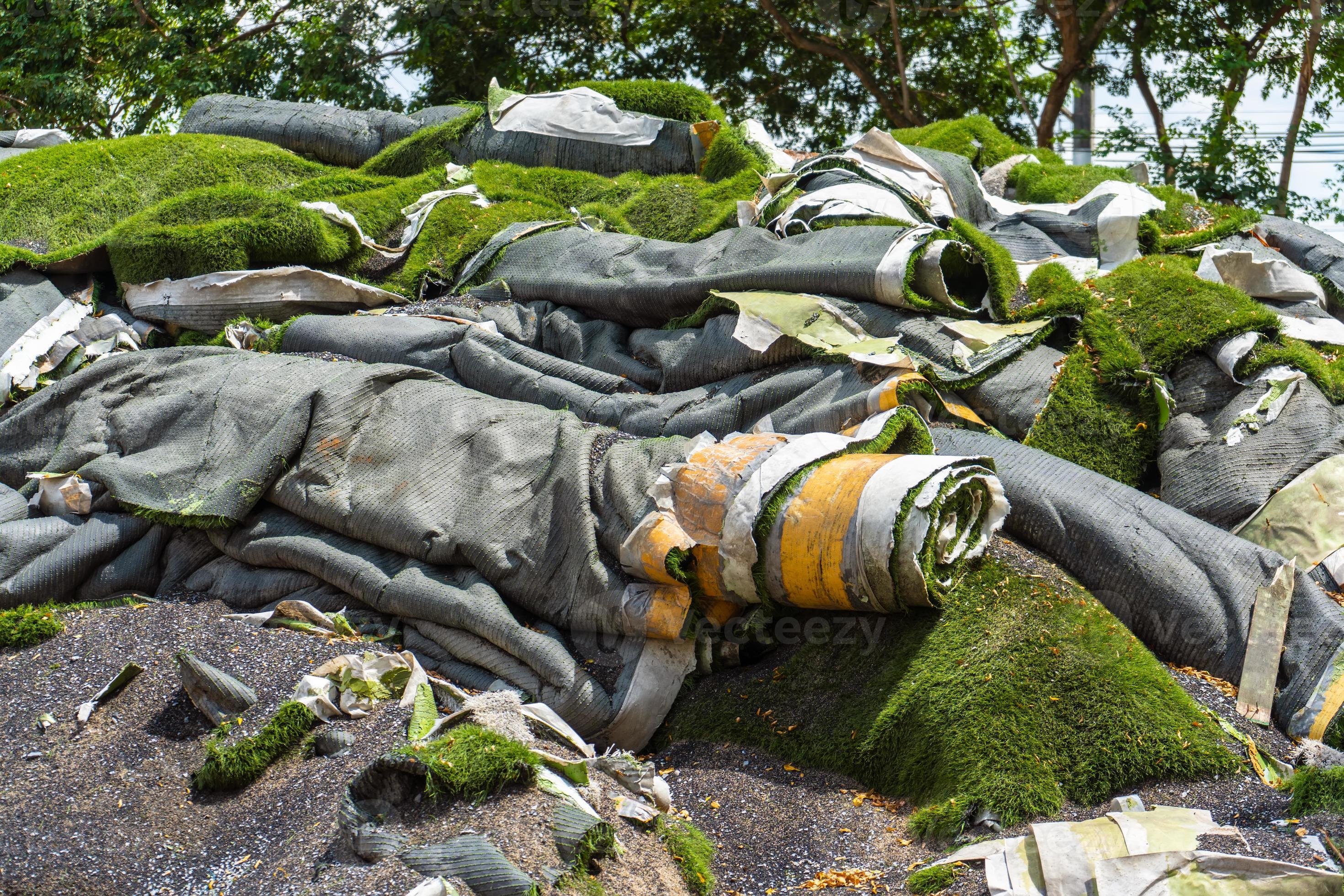 Pile of Artificial grass ,Rolls of synthetic turf removed were awaiting