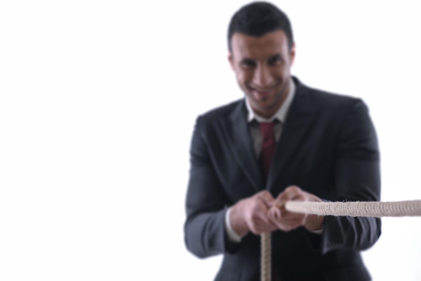 business man with rope isolated on white background photo