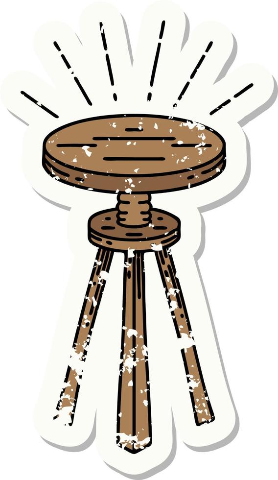 worn old sticker of a tattoo style wooden stool vector