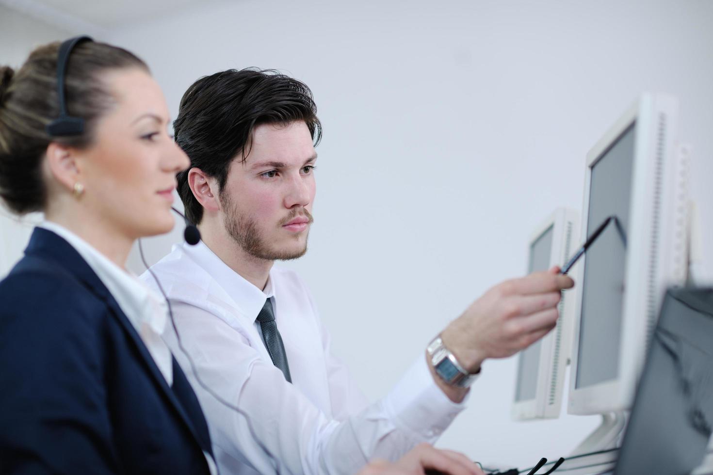 business people group working in customer and helpdesk office photo