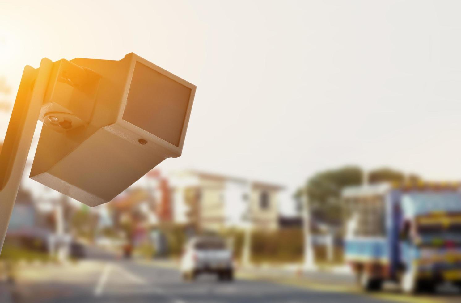 mini ip cctv camera installed on wooden pole to do the security instead of human by monitoring through mobile phone, soft and selective focus. photo