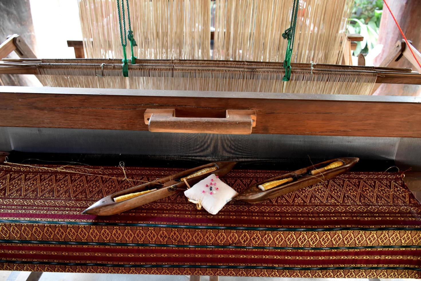 Weaving loom at home of asian people, they do the weaving with this loom at home after harvesting season. photo