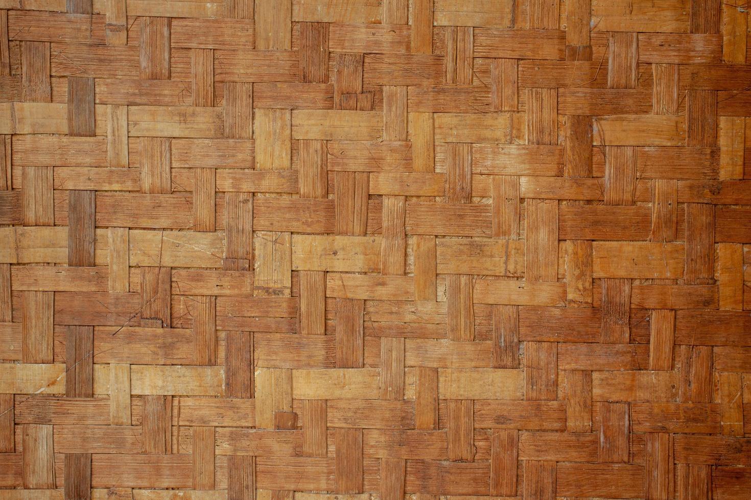 The background wall of the house is made of woven bamboo. photo