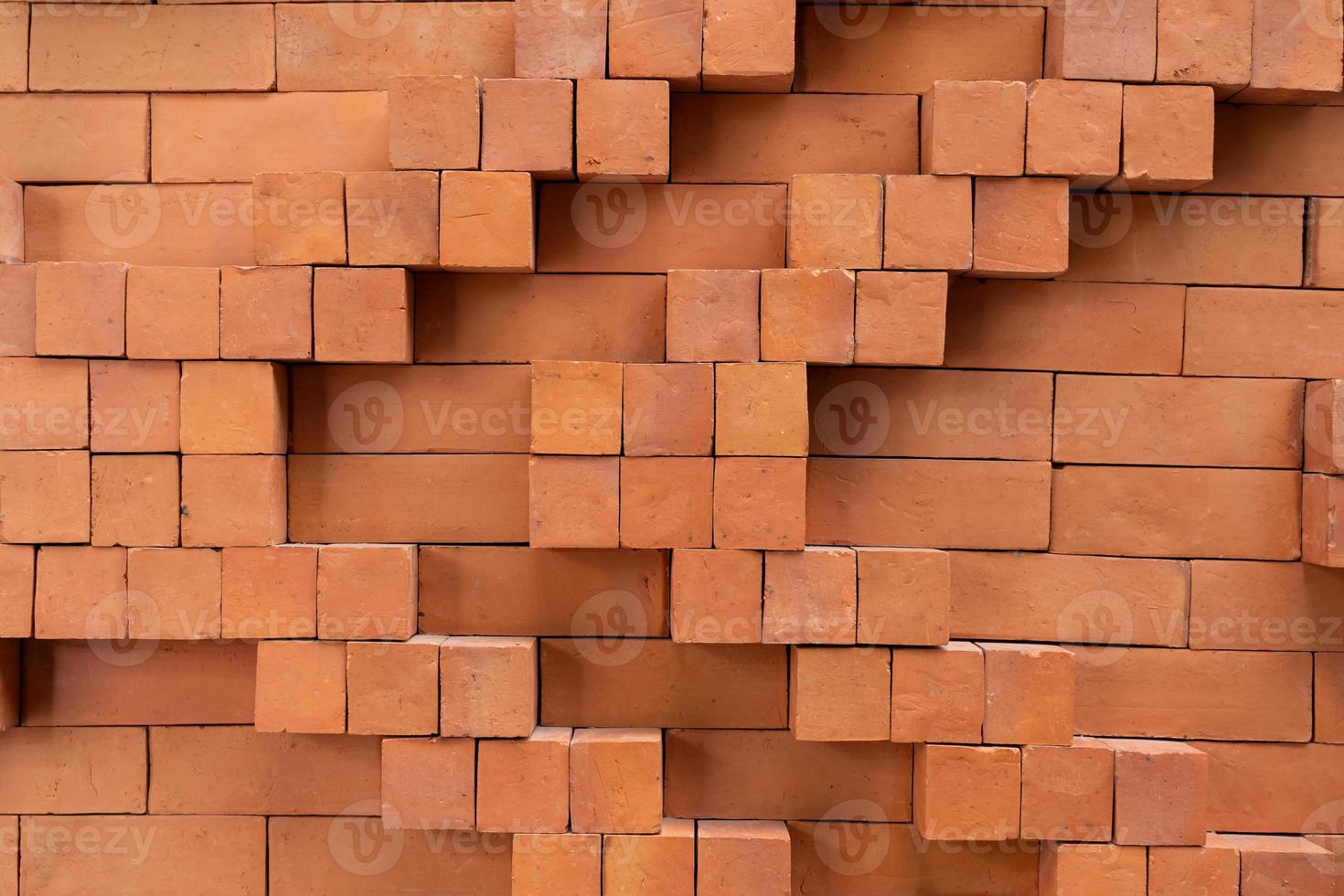 Red brick wall background in rural room. Abstract weathered texture stained old stucco light Red. Red grunge brick wall background. photo
