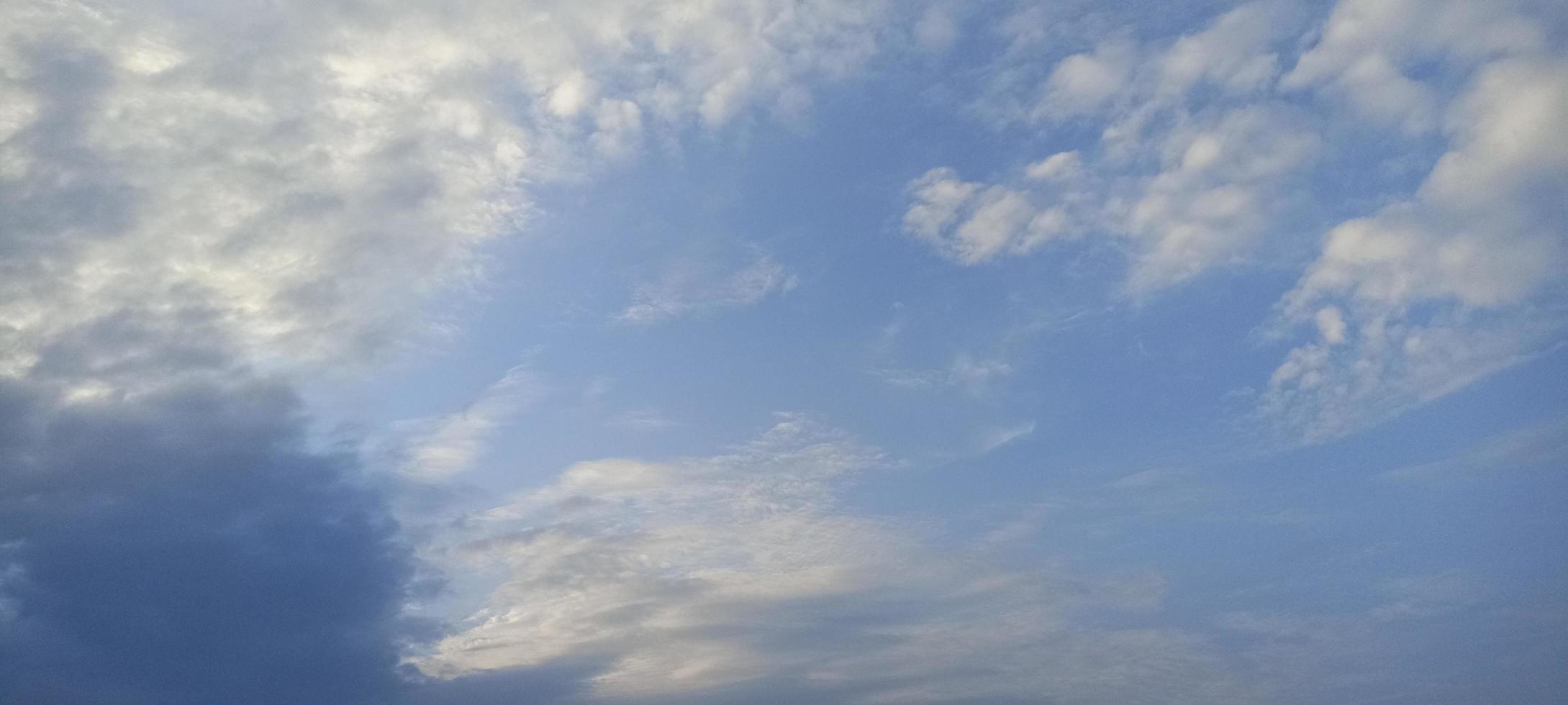 gray cloud with blue sky background photo