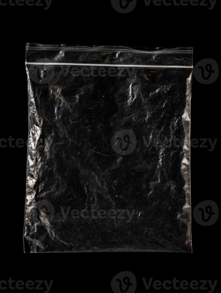 transparent plastic bag with zipper on black background for mockups photo