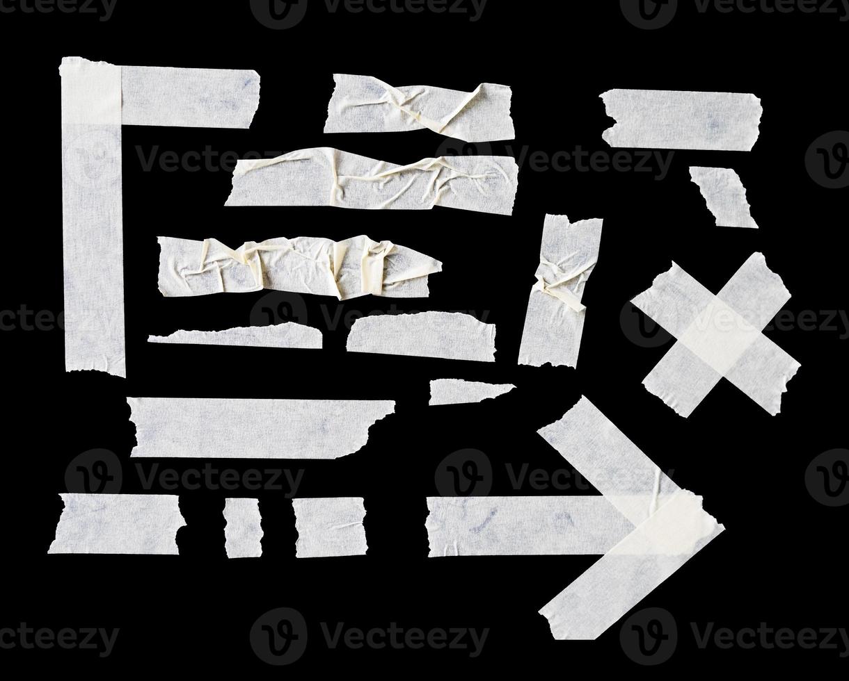 conjunto de cinta de papel crema en forma abstracta para elemento de diseño sobre fondo negro aislado foto