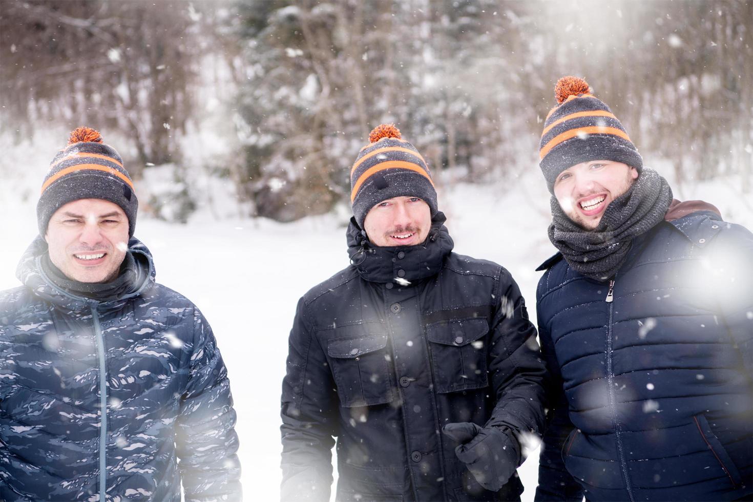 portrait of group young people in beautiful winter landscape photo