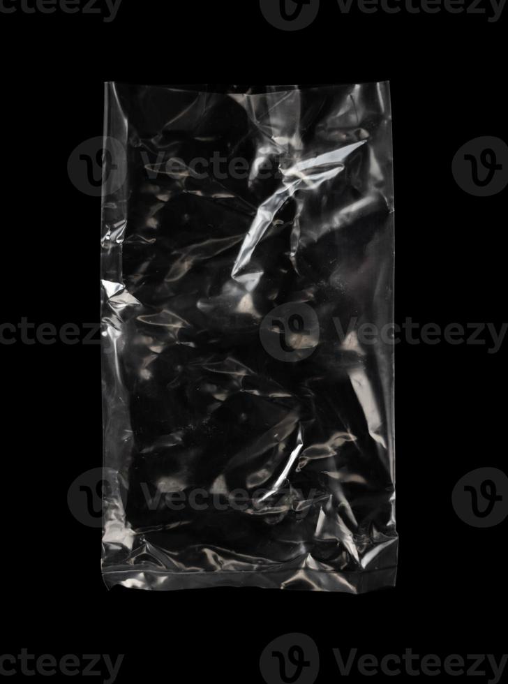 transparent plastic bag with zipper on black background for mockups photo