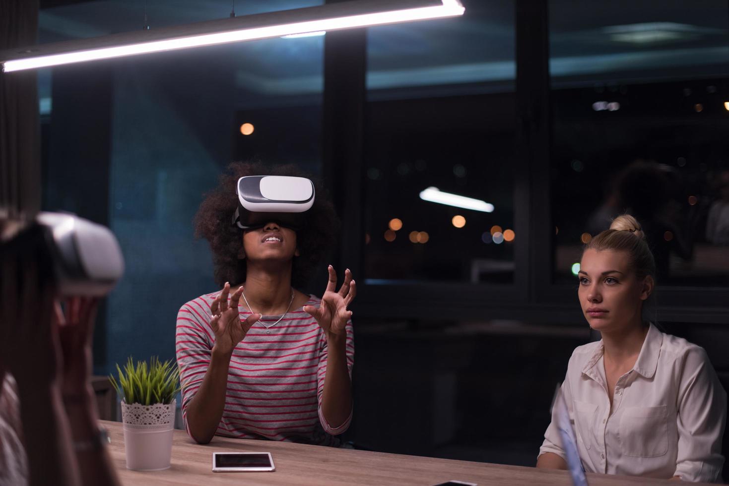 Multiethnic Business team using virtual reality headset photo