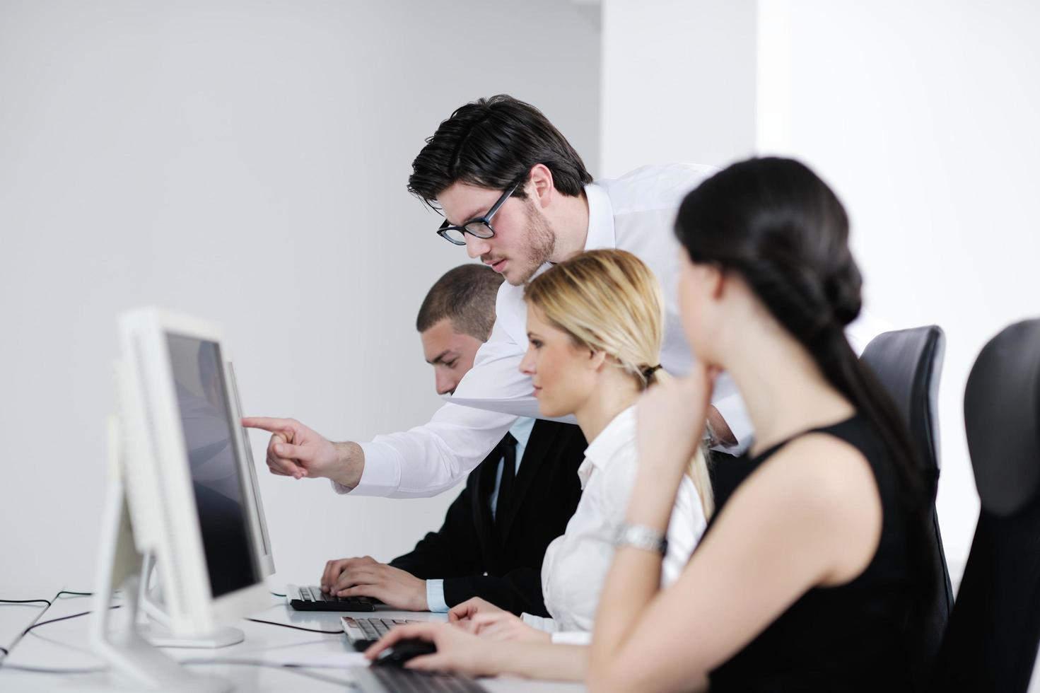 business people group working in customer and help desk office photo