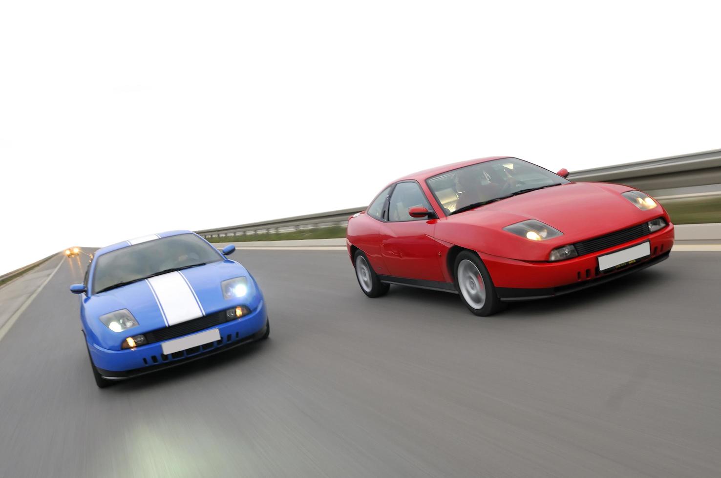 Tuning cars sacing down the highway photo