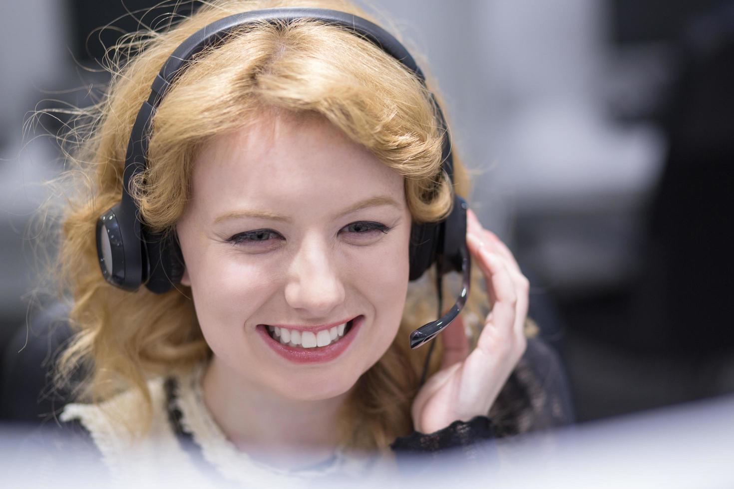 female call centre operator doing her job photo