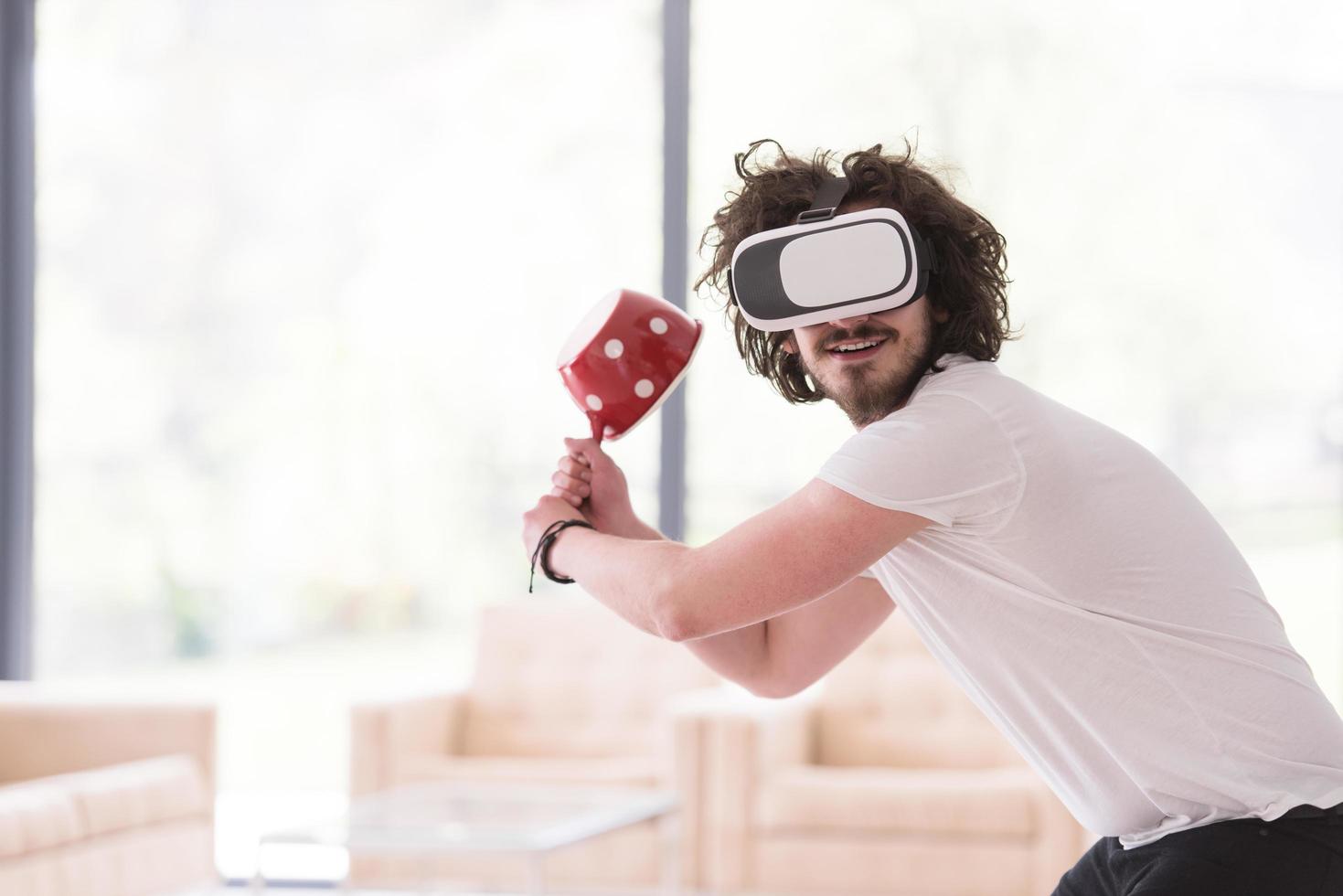 man using VR-headset glasses of virtual reality photo