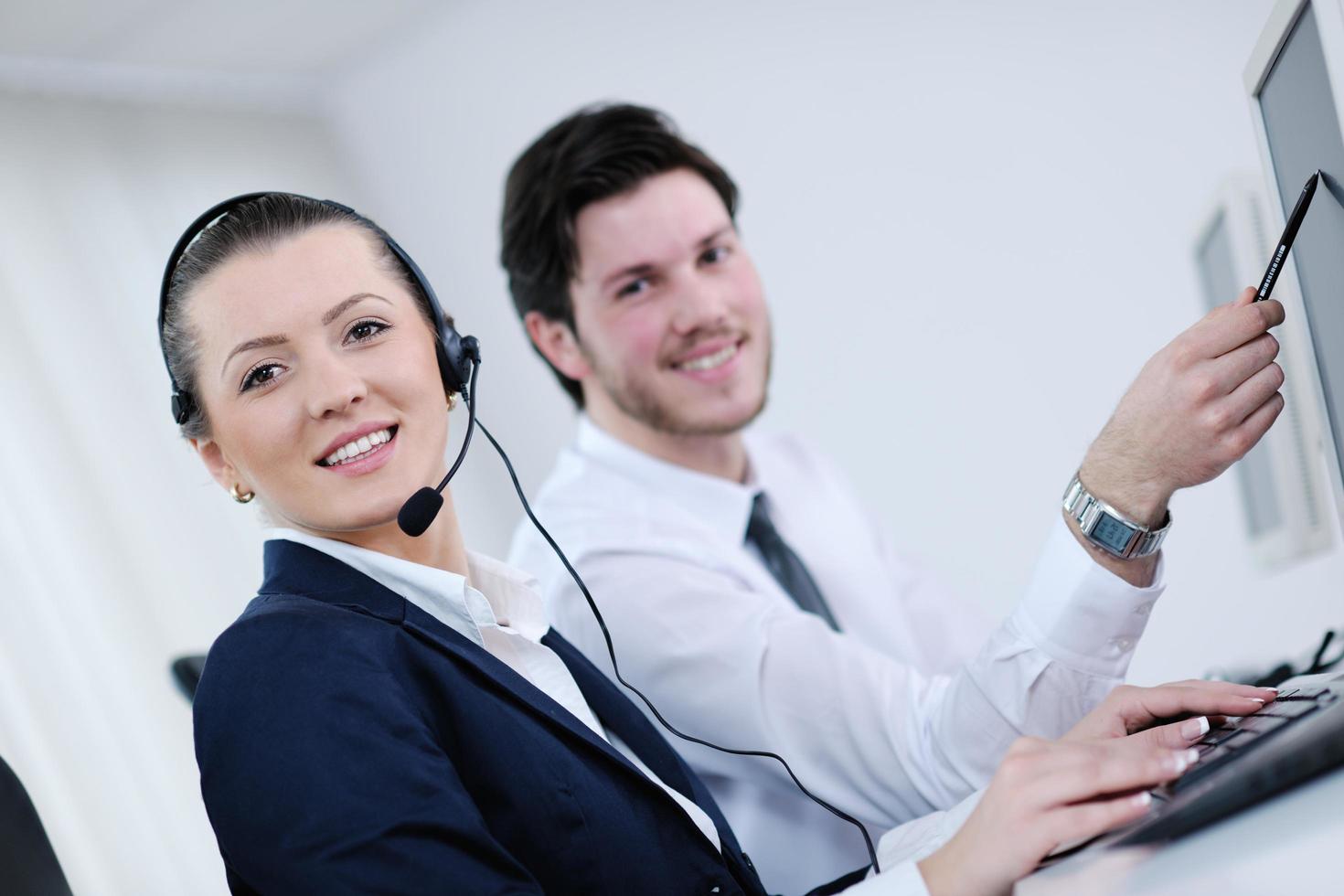 business people group working in customer and help desk office photo