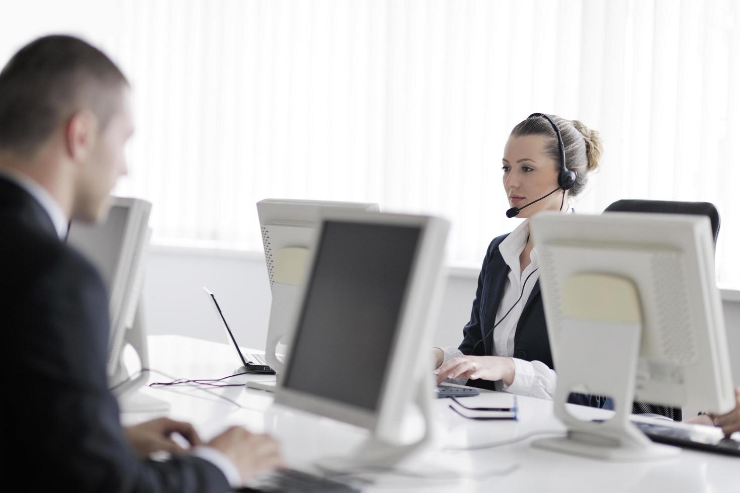 business people group working in customer and help desk office photo