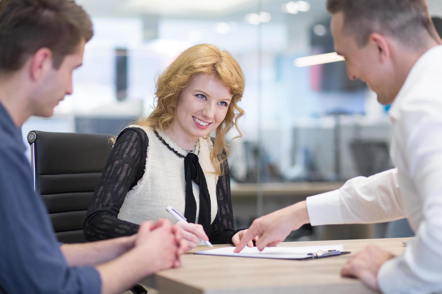 Startup Business Team At A Meeting at modern office building photo