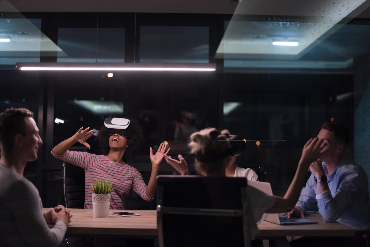 Multiethnic Business team using virtual reality headset photo