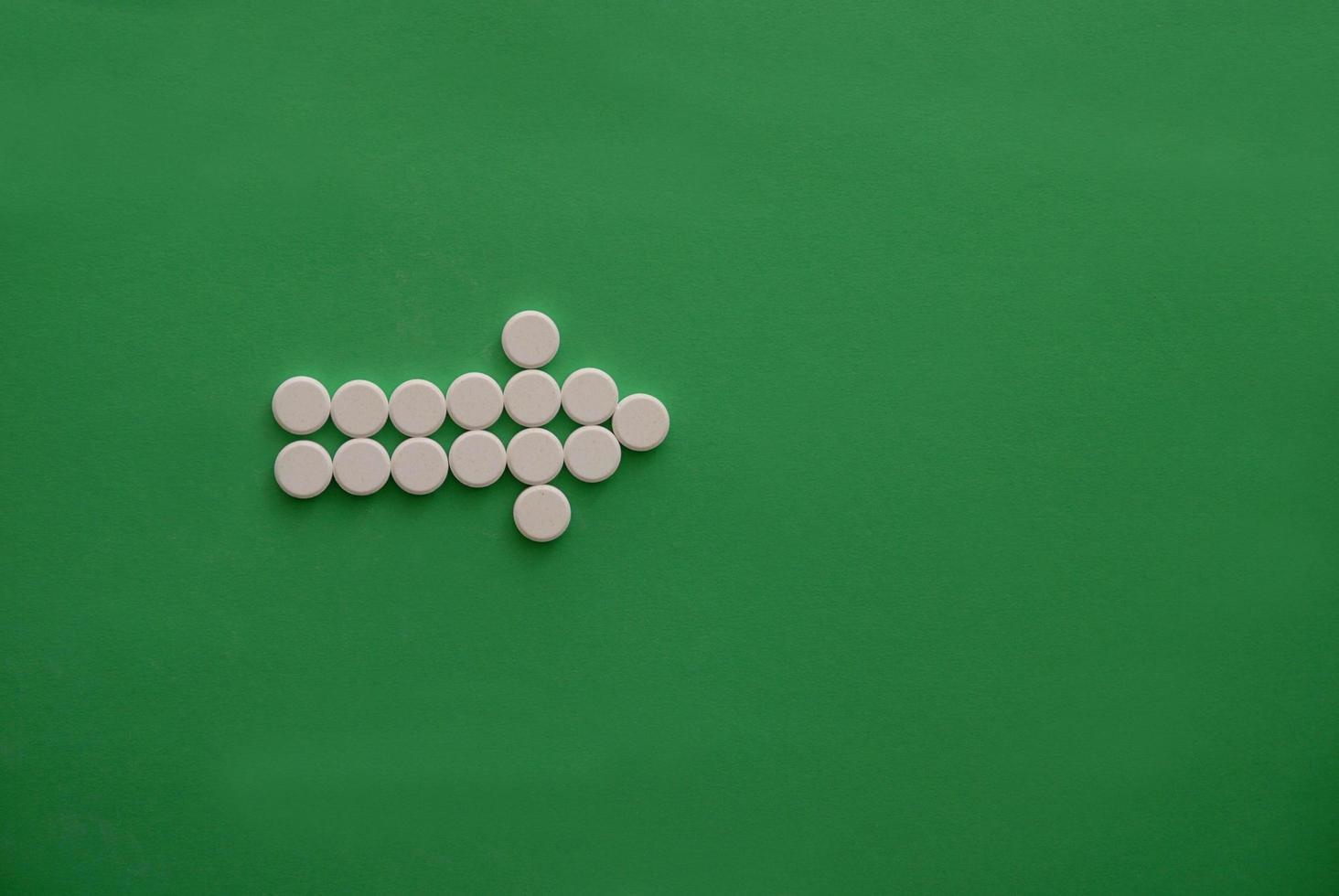 tablets in arrow formation photo