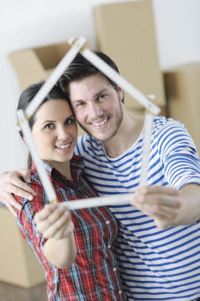 Young couple moving in new home photo