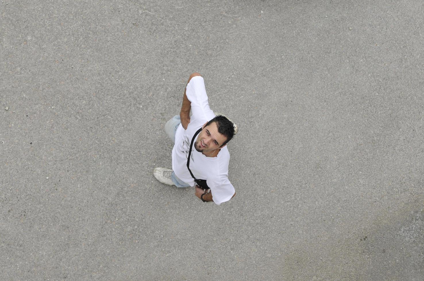 young man looking up photo