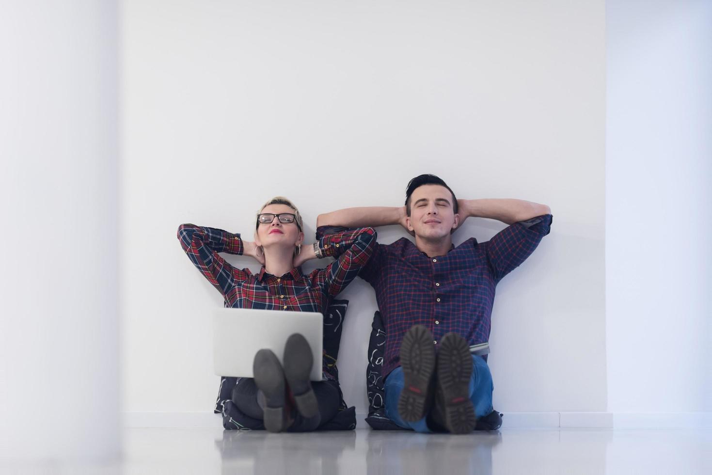 startup business, couple working on laptop computer at office photo