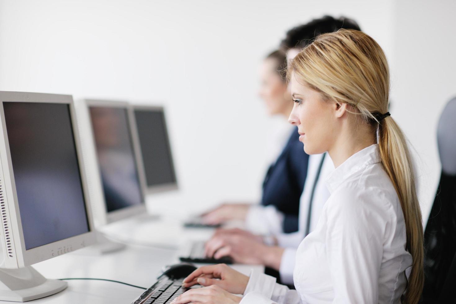 business people group working in customer and helpdesk office photo