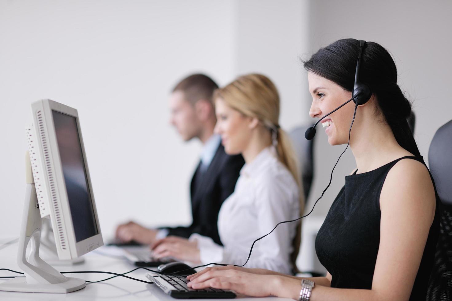 business people group working in customer and help desk office photo
