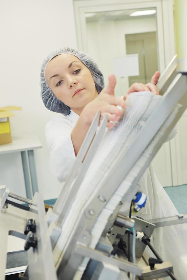 woman worker in pharmacy company photo