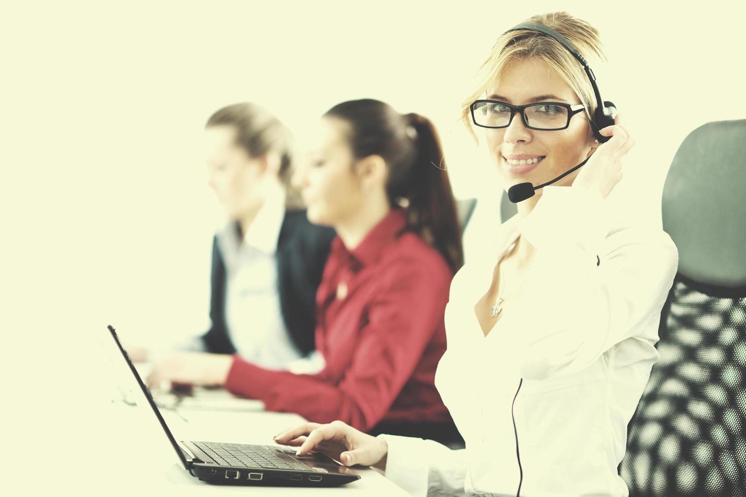 business woman group with headphones photo