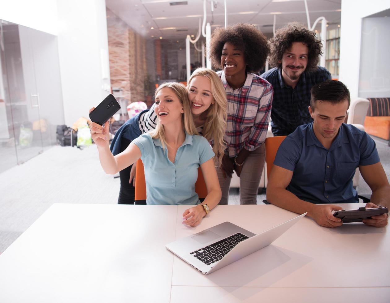 Multiethnic startup business team on meeting photo