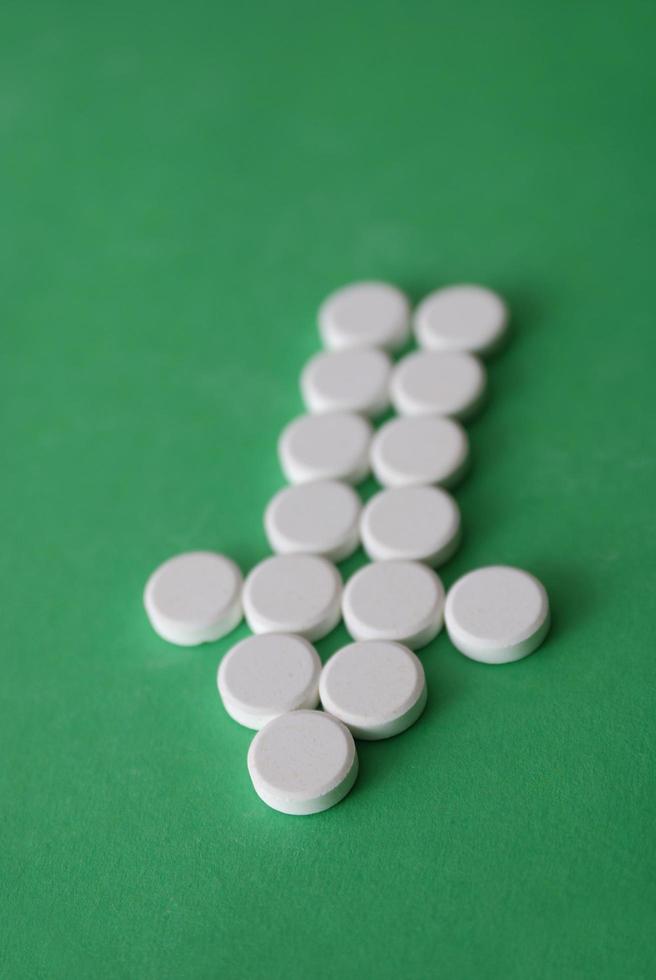 tablets in arrow formation photo