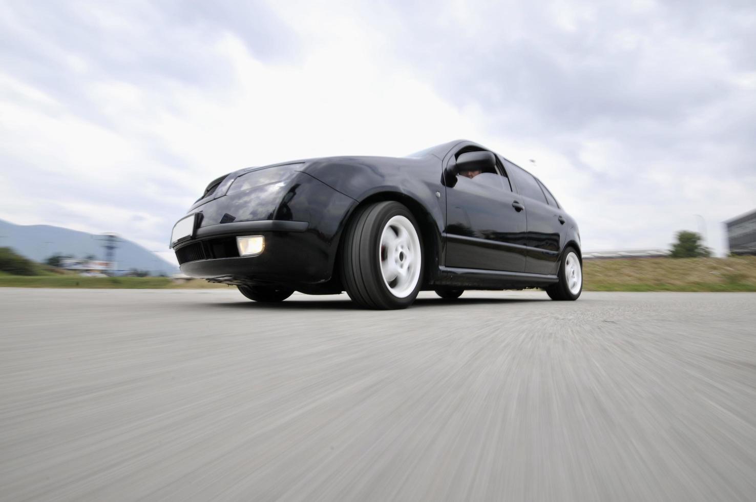 Fast car moving with motion blur photo
