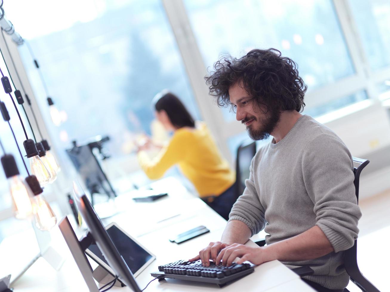 business persong working at modern office photo