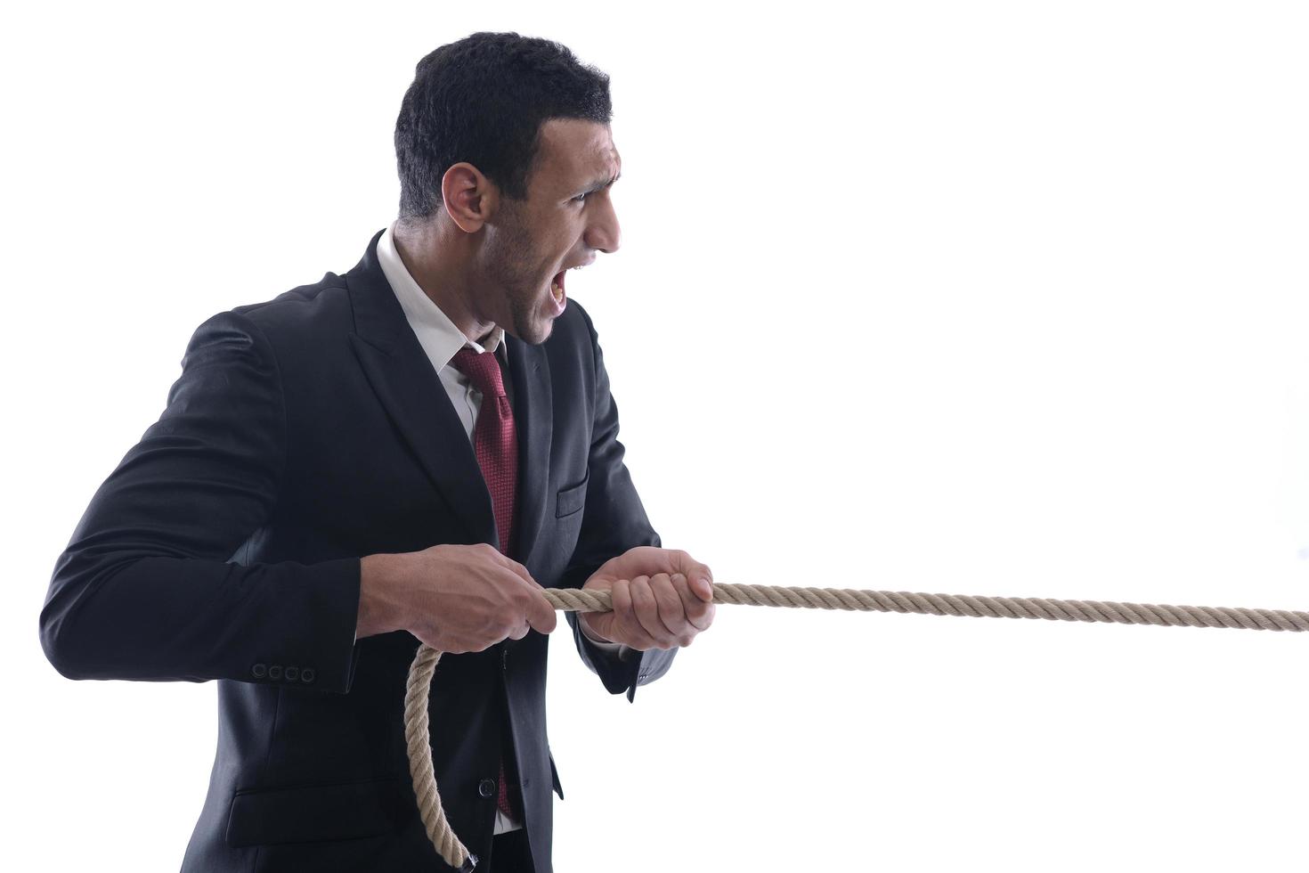 business man with rope isolated on white background photo