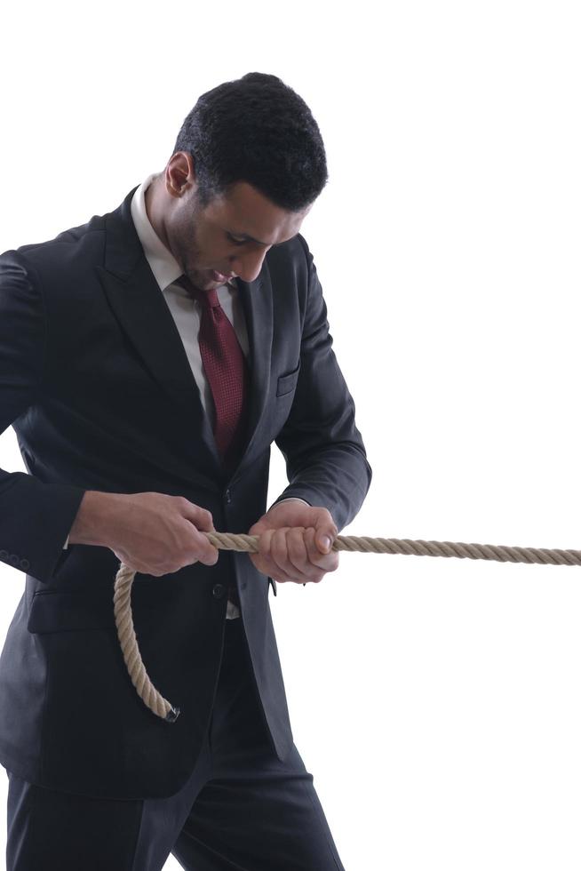 business man with rope isolated on white background photo