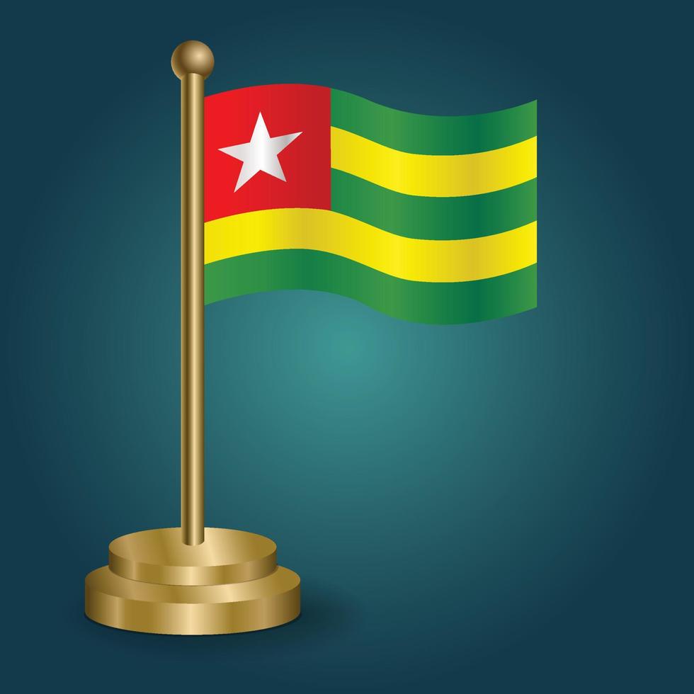 Togo national flag on golden pole on gradation isolated dark background. table flag, vector illustration