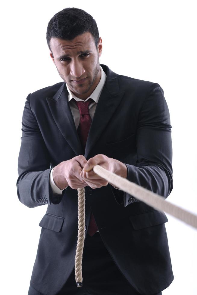 business man with rope isolated on white background photo