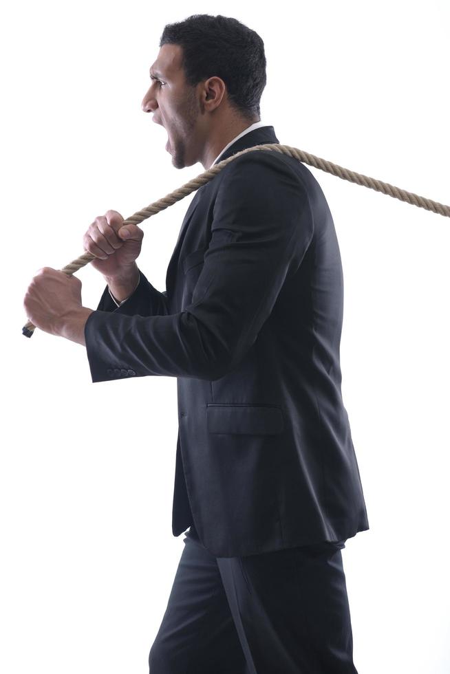 business man with rope isolated on white background photo