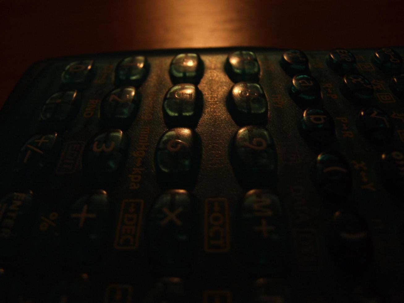 Calculator on table photo