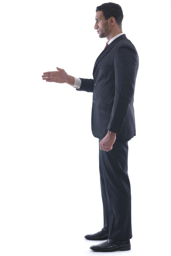 business man giving you a hand shake photo