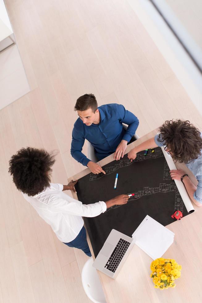 top view of Multiethnic startup business team on meeting photo