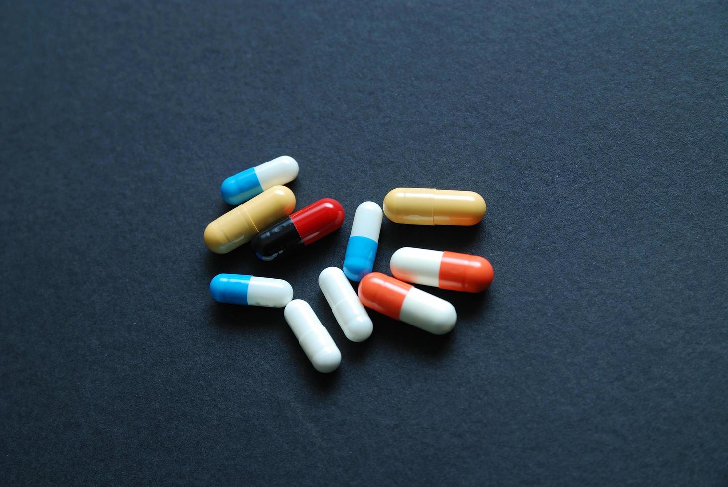 pills on black photo