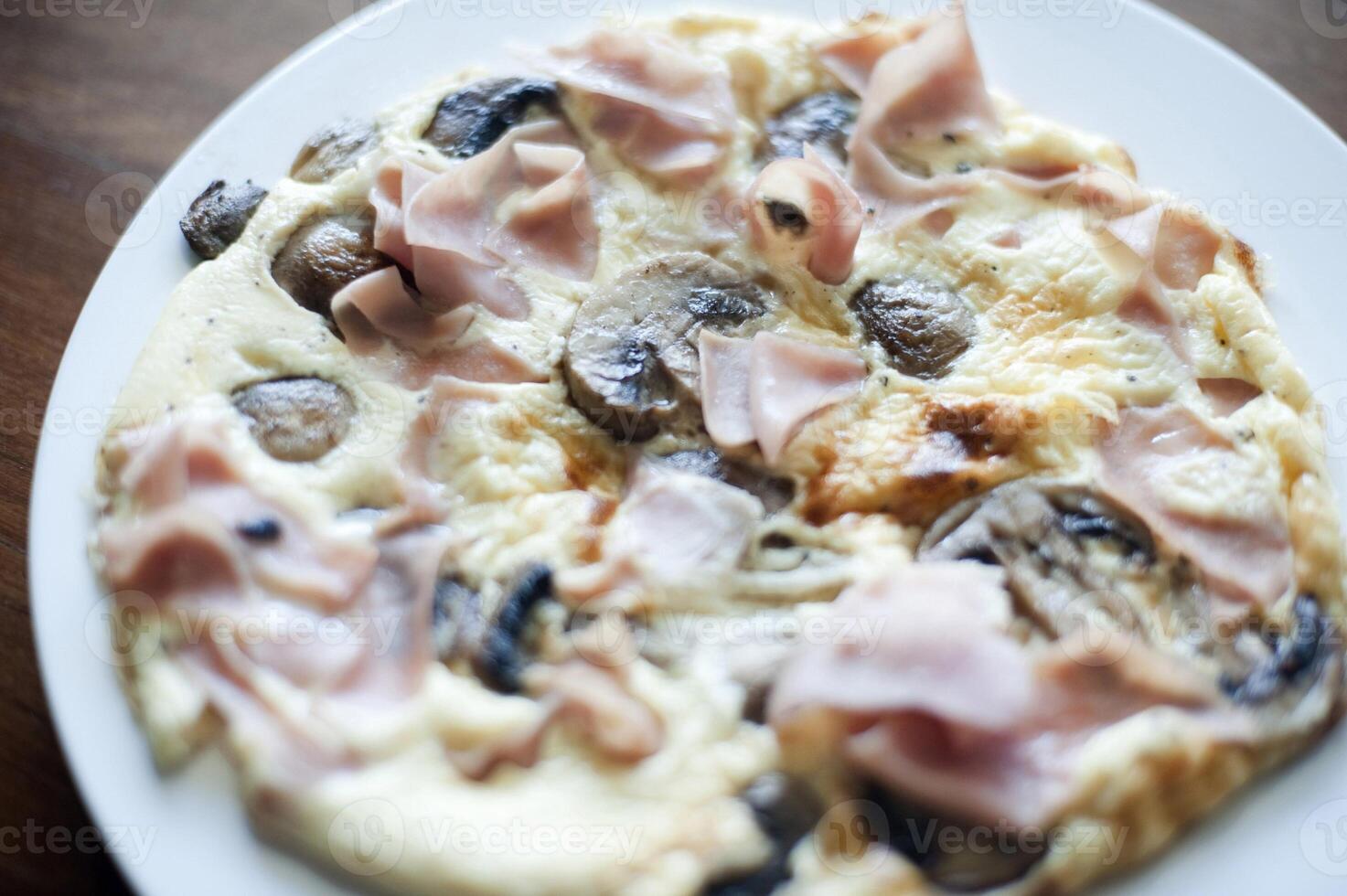 Ham and mushroom omelette 12145161 Stock Photo at Vecteezy